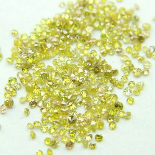 50 יהלומים צהובים Natural diamond לשיבוץ ליטוש עגול בקוטר: 0.70 מ"מ ניקיון: i1-i3