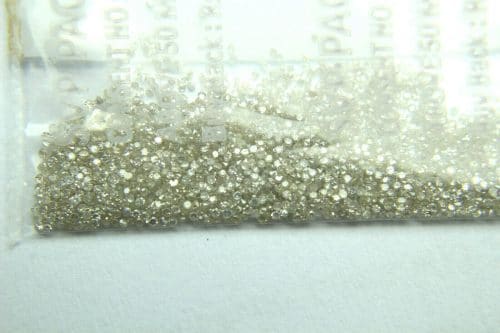50 יהלומים חום Natural diamond לשיבוץ ליטוש עגול בקוטר: 0.70 מ"מ ניקיון: i